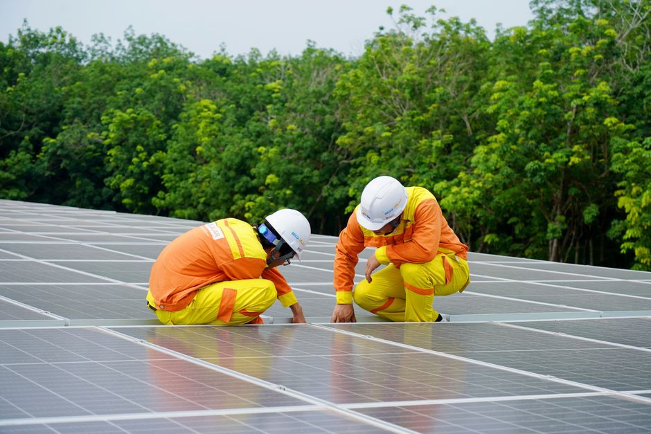 Solar installation team on a residential roof